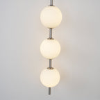 Vertical Globe Plug-in Wall Lamp