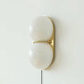 Two Globe Glass Plug-in Wall Sconce